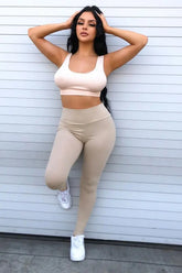 Women's high rise cotton legging in tan, size L.
